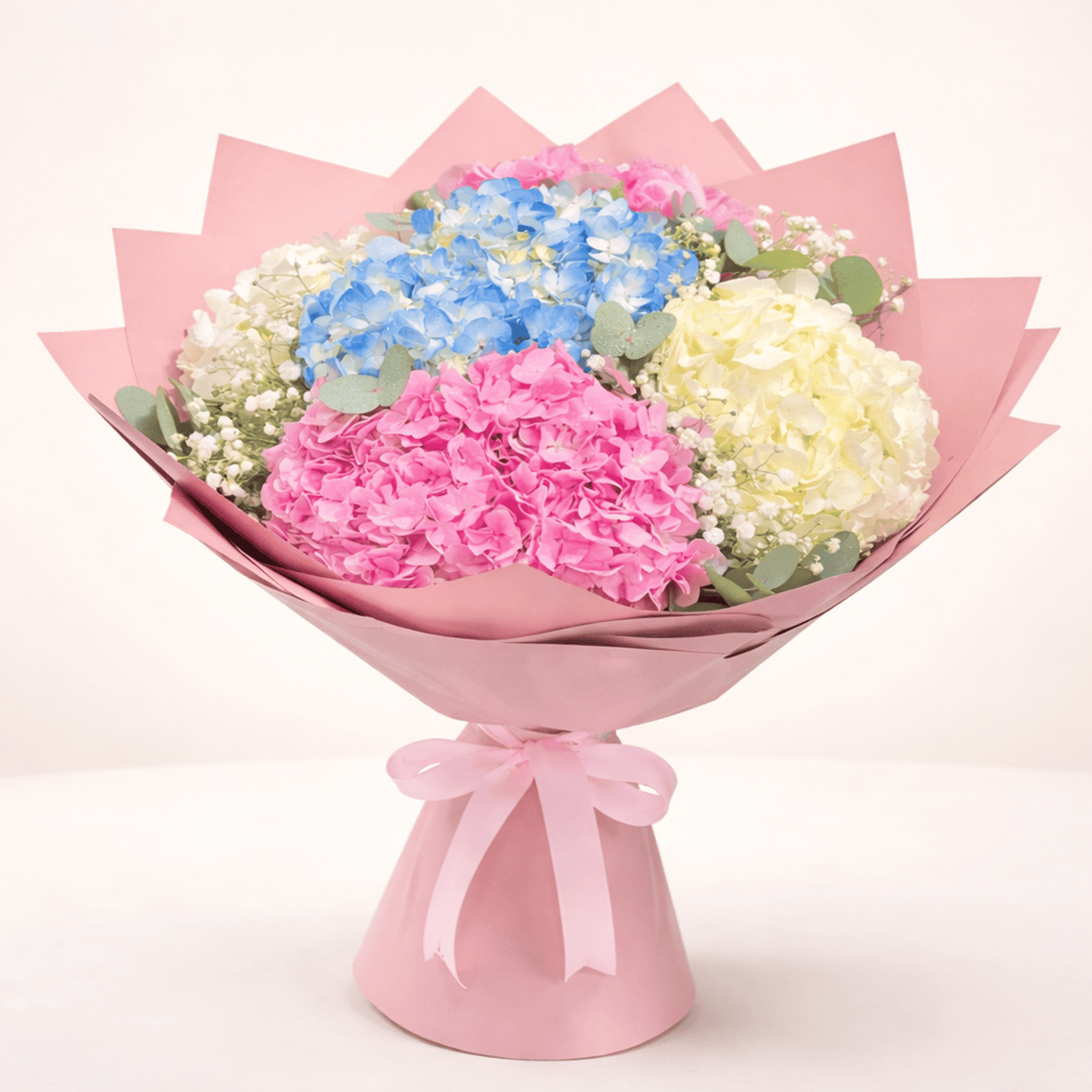 Mixed white, pink, and blue hydrangea bouquet by Buy Flower Box, flower delivery in Kuwait