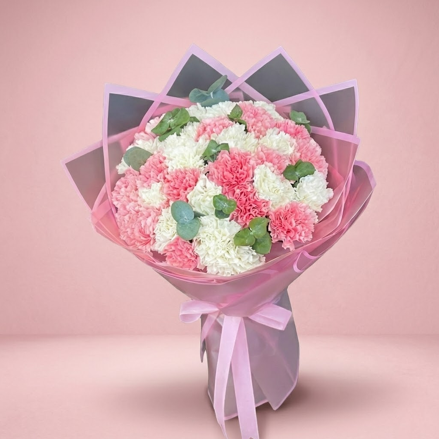 Pink and white carnation bouquet with 20 stems for flower delivery in Kuwait