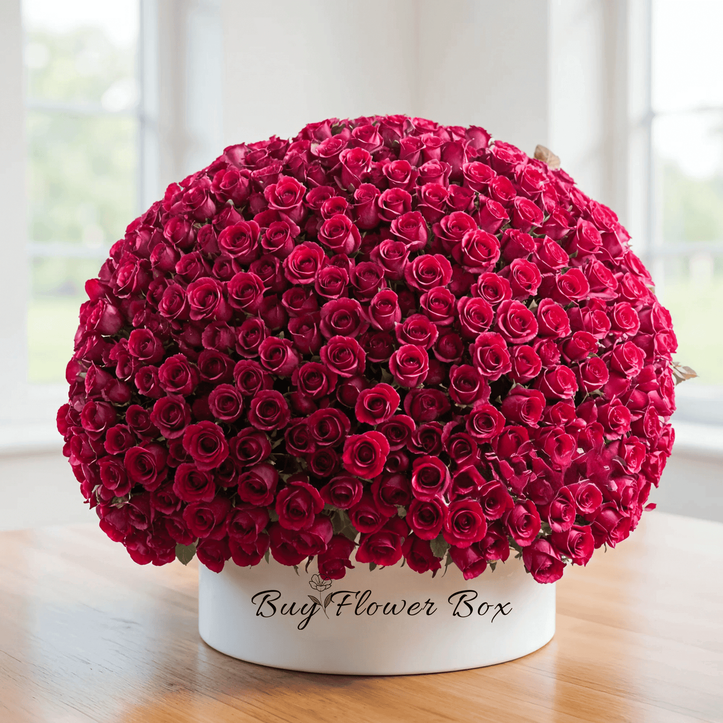 Luxury red rose hatbox arrangement for flower delivery in Kuwait