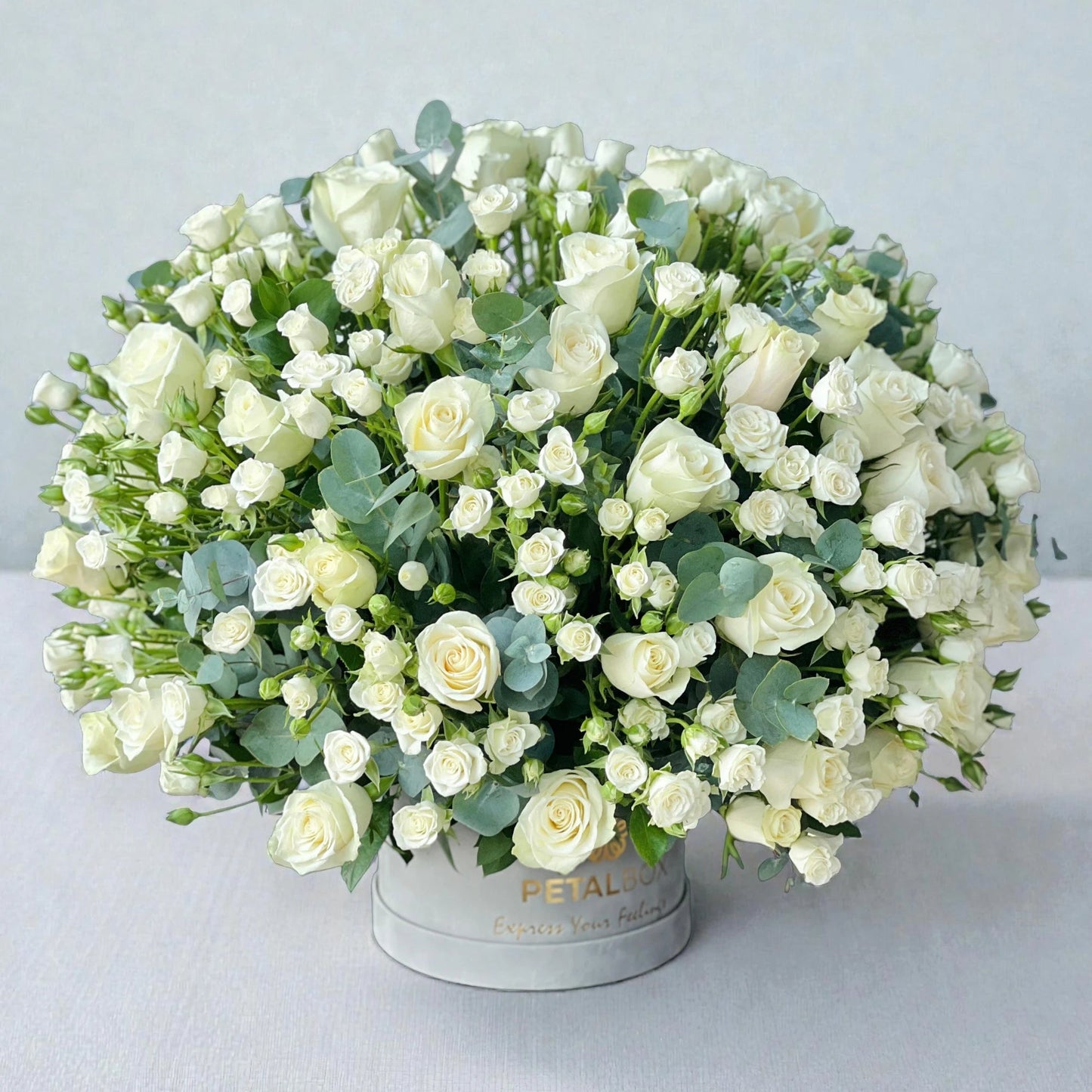 White roses and spray roses flower box arrangement