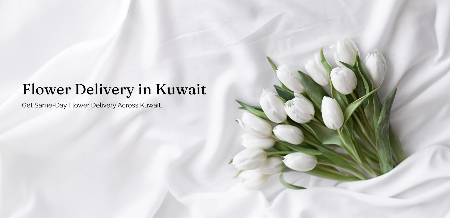 White tulips on a white fabric background with text about flower delivery in Kuwait.