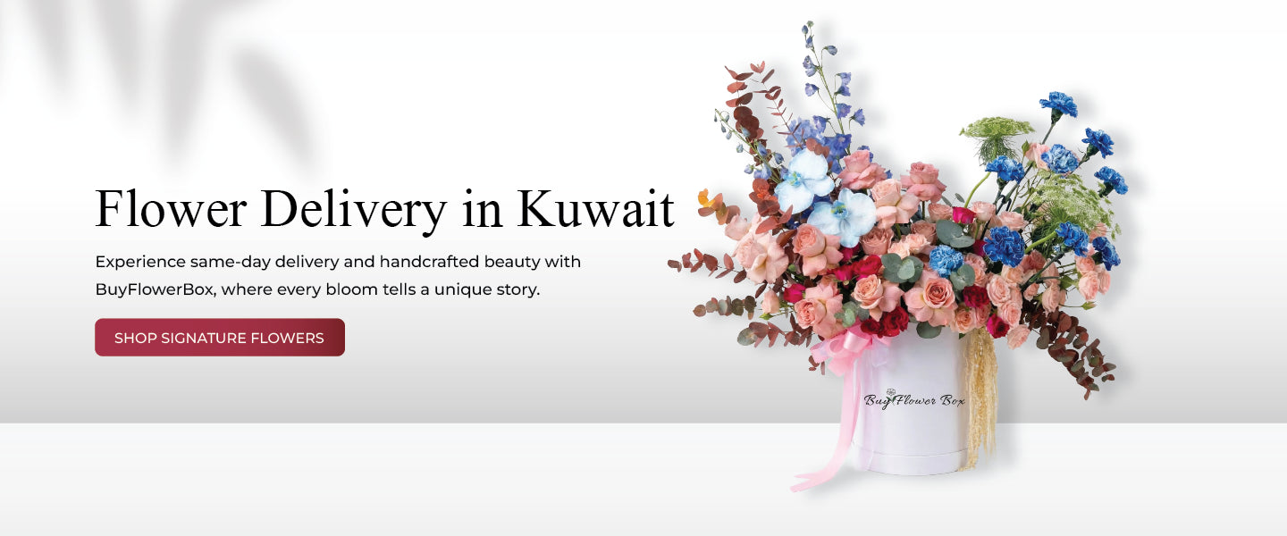 Flower delivery banner featuring a large pastel bouquet of roses, blue and pink flowers arranged in a white “BuyFlowerBox” box, with text promoting same-day flower delivery in Kuwait and a “Shop Signature Flowers” button.