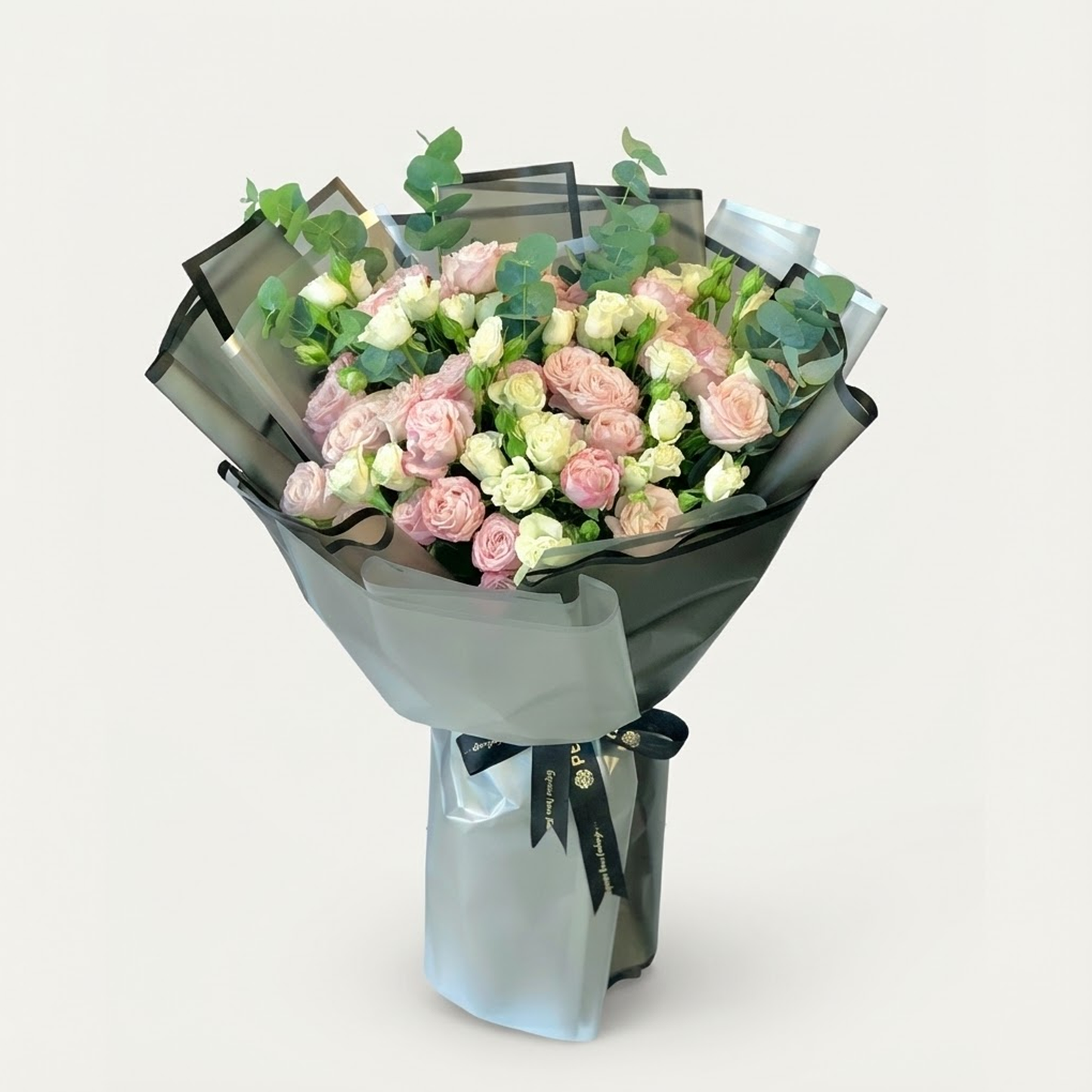 Pink and white spray rose bouquet with 20 stems for flower delivery in Kuwait