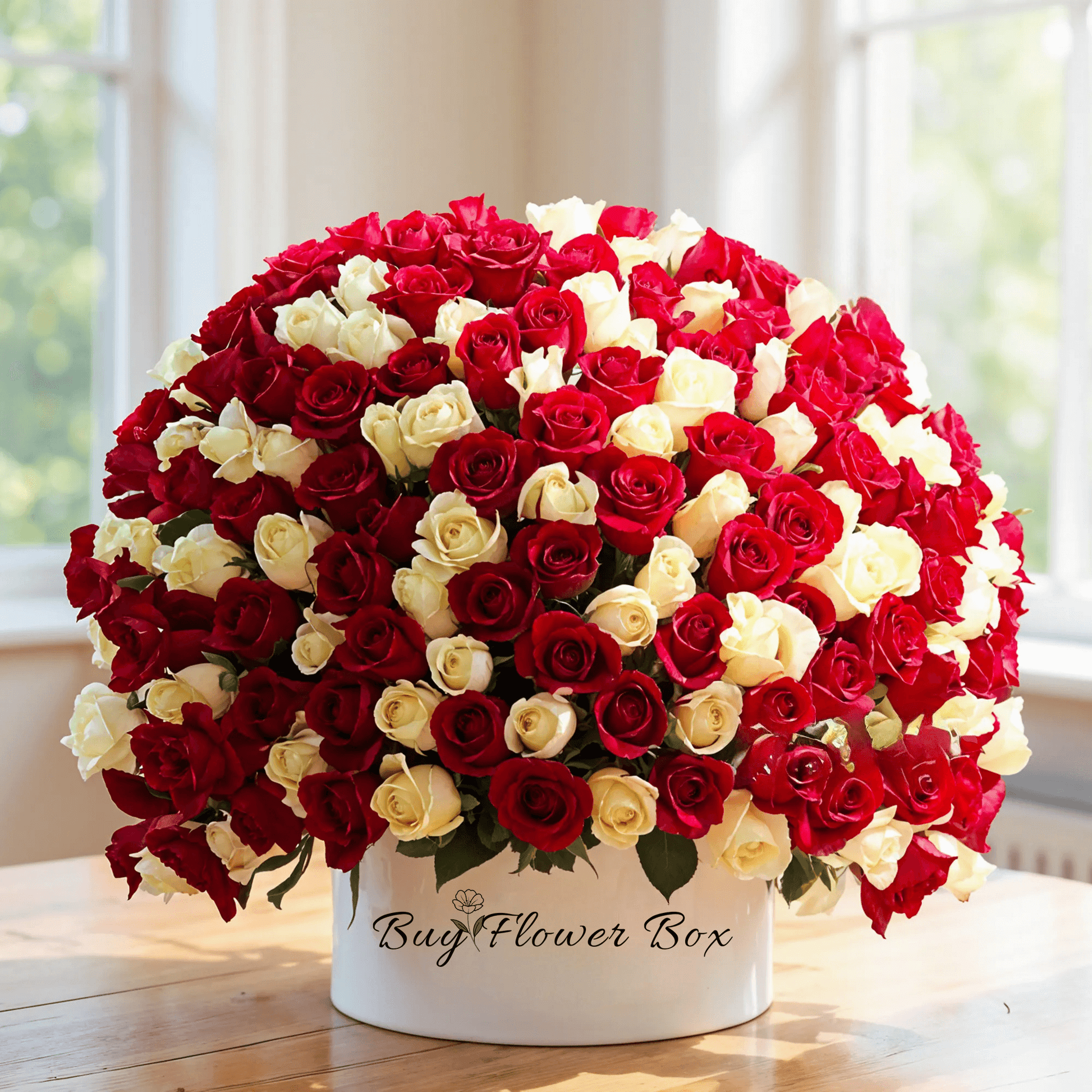 Grand red and white rose hatbox arrangement for flower delivery in Kuwait