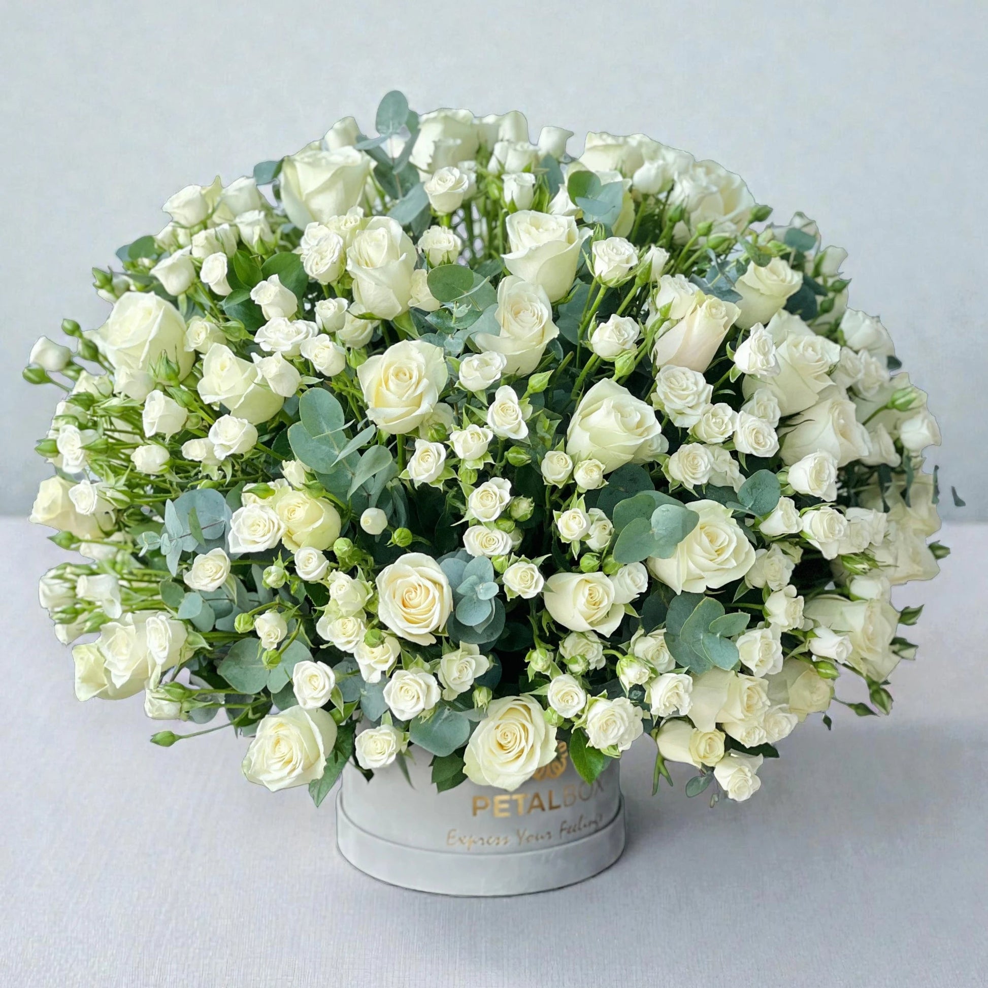 White roses and spray roses flower box arrangement